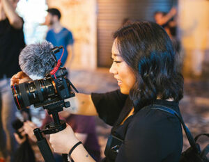 A lady recording a Video Blog