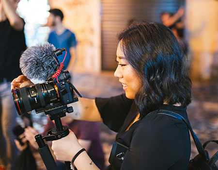 A lady recording a Video Blog